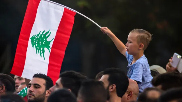 A boy with the flag of Lebanon (Shutterstock)	