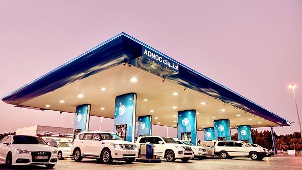 ADNOC distribution station at dusk