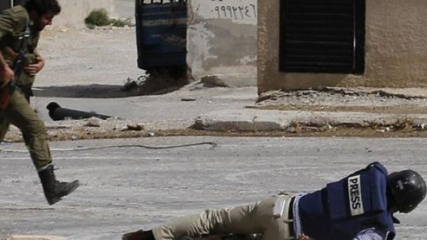 An AFP journalist takes cover during an attack in Syria. (AFP/File)