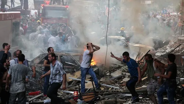 The aftermath of last week's twin suicide blasts in Beirut which left 37 dead and 181 injured. (AFP/Joseph Eid)