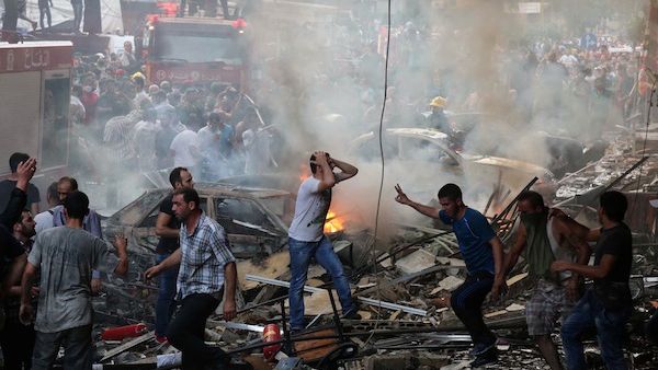 The aftermath of last week's twin suicide blasts in Beirut which left 37 dead and 181 injured. (AFP/Joseph Eid)