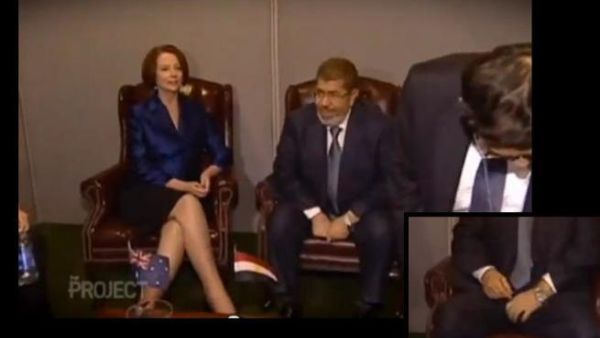 President Morsi engaged in the 'indecent act'. President Morsi engaged in the 'indecent act'.