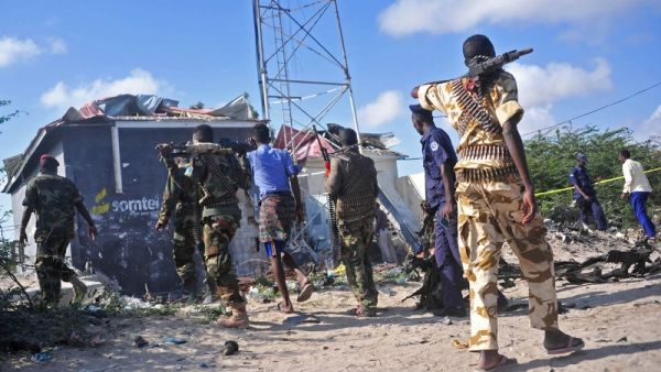 Members of the Somalian military forces stand at the site of a suicide Attack. (AFP/ File Photo)