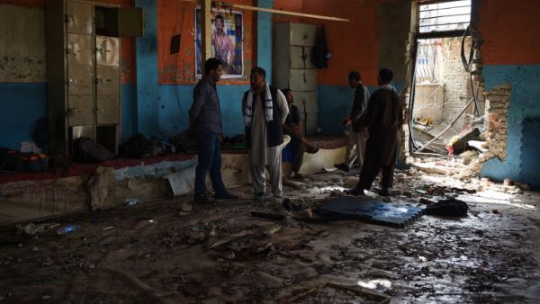  At least 20 people killed including two Afghan journalists after twin blasts at a Kabul wrestling club on September 5 that left another 70 wounded, officials said. (WAKIL KOHSAR / AFP) 
