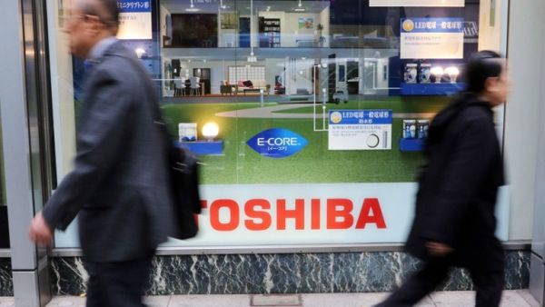 Toshiba has reported a loss of $4.8 billion and faces the possibility of a delisting from the Tokyo Stock Exchange. (AFP) Toshiba has reported a loss of $4.8 billion and faces the possibility of a delisting from the Tokyo Stock Exchange. (AFP)