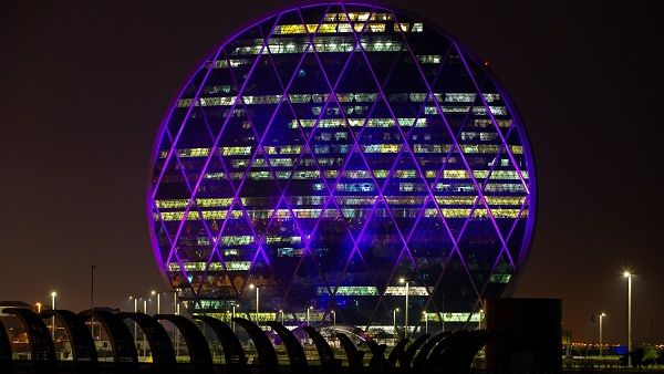 Aldar HQ building turns purple for NYUAD's fifth Commencement.
