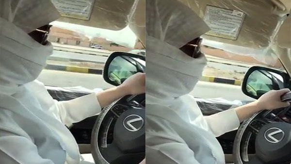 فتاة سعودية تقود لكزس بزي رجل