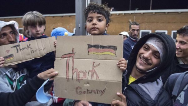 Refugees arrive at the train station in Germany. (AFP/File)