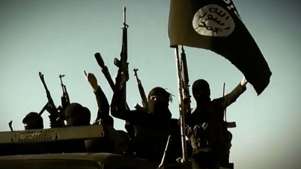 An image taken from a propaganda video released by the Islamic State's al-Furqan Media allegedly shows IS fighters raising their weapons. (AFP/File) 