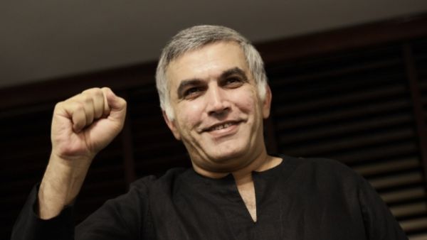 Bahraini human rights activist Nabeel Rajab gestures at his home in the village of Bani Jamrah. (AFP/File) 