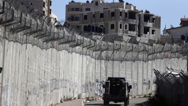 Al-Ram is separated from Jerusalem by Israel's 'separation barrier' (AFP/File)