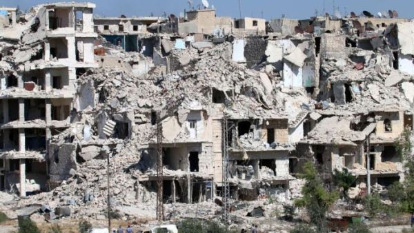 Heavily damaged buildings in the neighbourhood of Bani Zeid on Aleppo's northern outskirts. (AFP/George Ourfalian)
