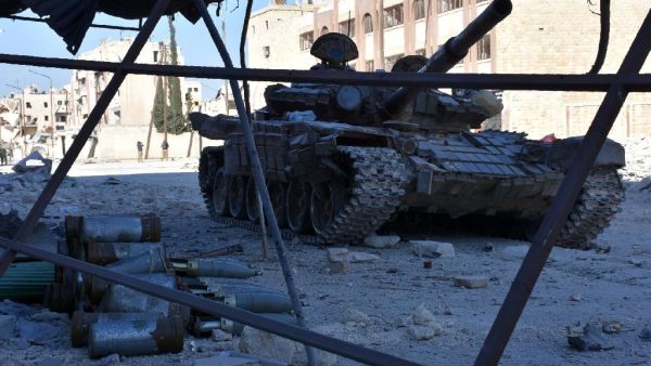 Syrian forces advance into the Masaken Hanano district of eastern Aleppo (AFP/George Ourfalian)