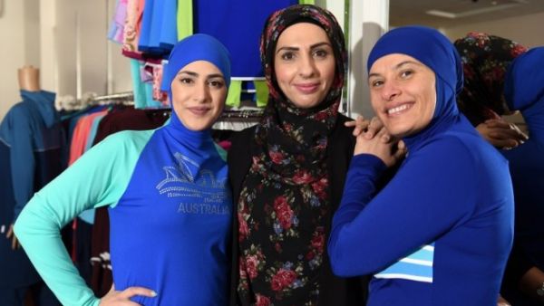 Muslim models display burkini swimsuits at a shop in western Sydney on August 19, 2016. (AFP/Saeed Khan)