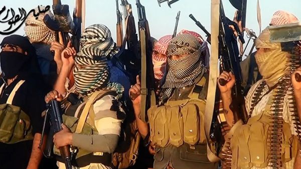 ISIS fighters celebrating in Tikrit, Iraq, last month. (AFP/File)  