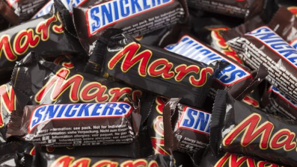 The recall follows the discovery of a piece of red plastic in one of Snickers bar purchased in Germany.  (Shutterstock/Ekaterina Minaeva)