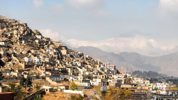 Around 2,000 houses in the dusty, poverty stricken area are painted in bright colours thank stop a new project run by Kabul's municipal authorities. (shutterstock)