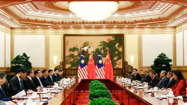 Malaysian and Chinese diplomats meet at the Great Hall of the People in Beijing on August 20, 2018. (AFP/ File)