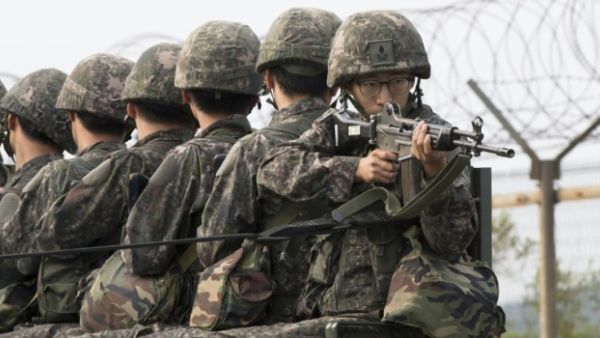 South Korean soldiers ride a military truck on the road leading to the truce village of Panmunjom in the border city of Paju on August 24, 2015. (AFP/ File Photo)