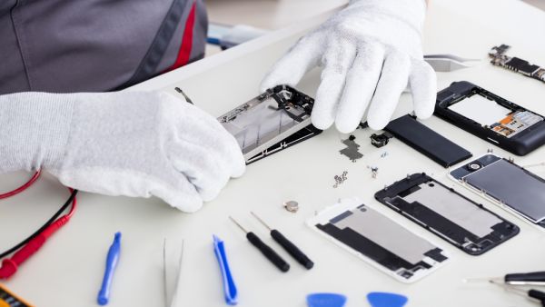 Mobile Technician Man. (Shutterstock/ File Photo)