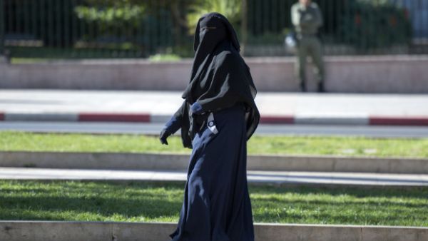 Government lawyers expect the law to prevail because it requires people to show their faces for identification purposes (AFP/File)