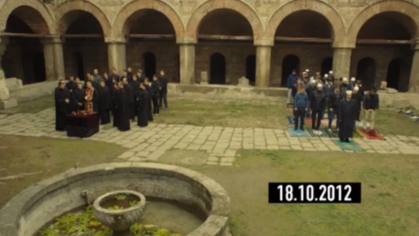 Macedonian Muslims and Christians simultaneously seek God's mercy. (YouTube screengrab)
