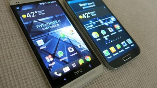 HTC One and the Samsung s4 are both slick phones but which is Arab friendly? (image courtesy of Z District)