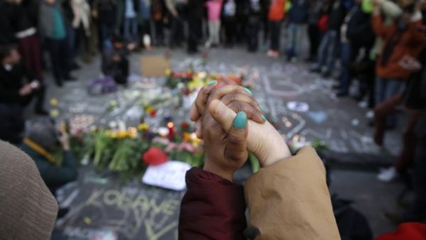 Police dispersed far-right hooligans who disrupted mourners at shrine for victims of Brussels attacks. (AFP/File)