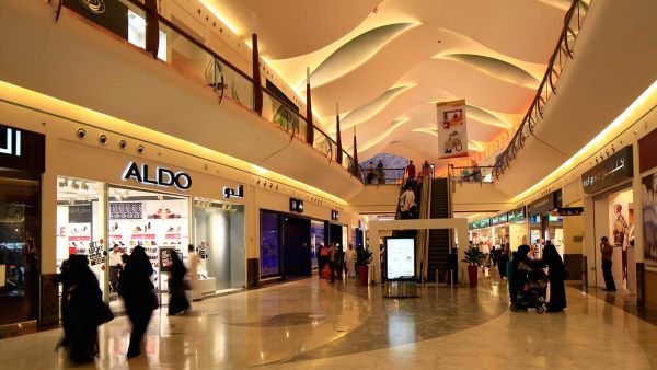The threat to local retailers might turn into an opportunity if these companies restructured their balance sheets and concentrated on niche markets, one economist says. (Mall of Arabia)