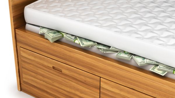 Tucking away cash at home may also be driven by either a distrust of banks or a desire to evade tax authorities who are tracking private assets – or both.  (Shutterstock)