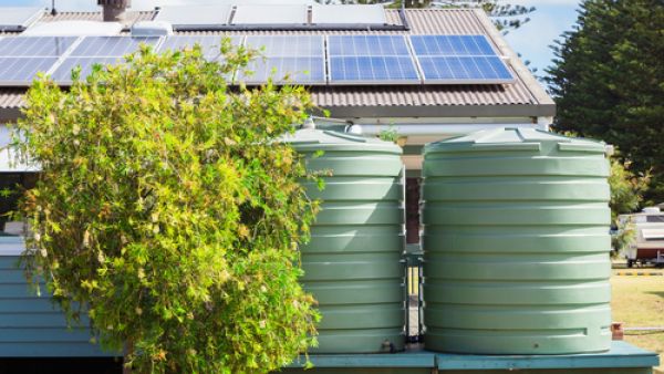 Solar panels and rainwater tanks lessen the impact on the environment. (Shutterstock) 