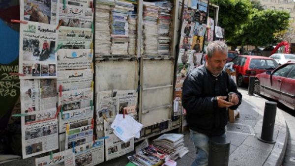 Print media in Lebanon “has always been a mirror of the political divisions in the country and it has always supported itself financially from outside political sources, be it internal or external state funding.” (AFP/Joseph Eid)