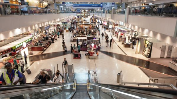 If you're flying with Emirates and a have a layover of four hours or more, you can collect free meal vouchers at Dubai Airport. (Shutterstock/ Alexandra Lande)