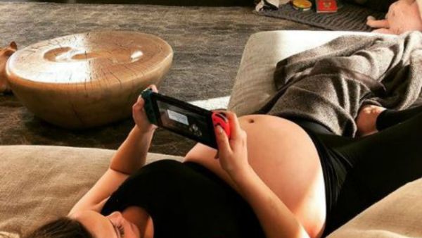 Chrissy later took to Instagram to insist she was making most of her night at home (Source: chrissyteigen - Instagram)