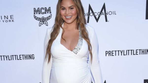 Chrissy Teigen admitted she hopes no one would "look that close" at her feet (Source: DFree - Shutterstock)