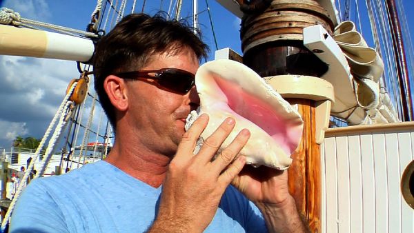 Conch Shell Blowing Contest. (YouTube Screenshot)