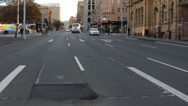 Dark Mofo artist Mike Parr is to be buried for three days under main the Hobart Road in Tasmania. (Twitter) 