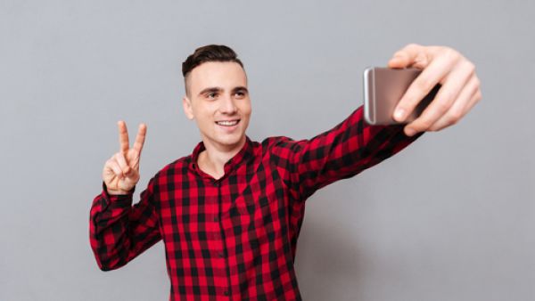 Researchers found the best results came from photographs of people flashing the peace sign. (Shutterstock)