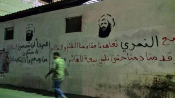 رسوم للنمر على حائط في العوامية
