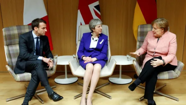 British Prime Minister Theresa May (C), German Chancellor Angela Merkel (R) and French President Emmanuel Macron. (AFP/ File Photo)