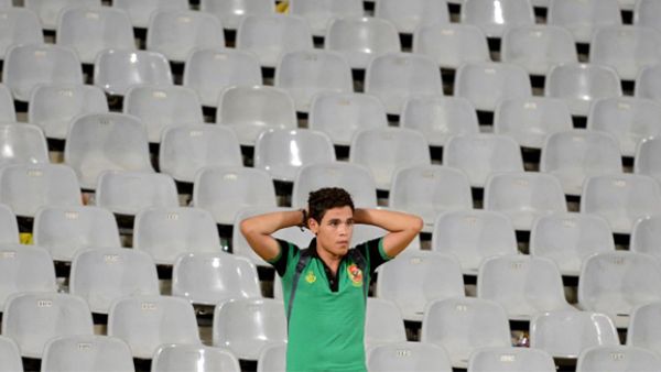 An Ahly supporter reacts following the CAF Champions League group A stage football match between Egypt's Al-Ahly and Morocco's Wydad Casablanca at the Borg el-Arab Stadium in Alexandria. (AFP/File)