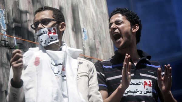 Journalists protesting against police abuse, in front of the Press Syndicate in 2014. (AFP/File)