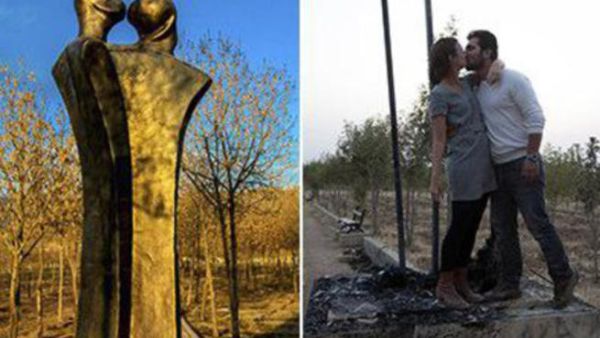 Iraqi couple emulate Sidq's Statue of Love in protest against people who vandalized it. [alarabya.net]