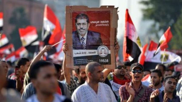 فوز مرشح الإخوان المسلمين الدكتور محمد مرسي برئاسة مصر