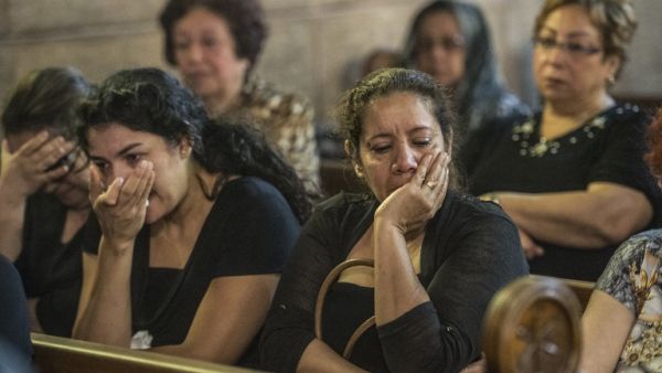 Relatives of the passengers killed in the EgyptAir crash attend a mourning service on May 22. (AFP/Khaled Desouki)