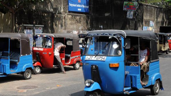 A Tuk tuk driver offering transport services. (AFP/ File)