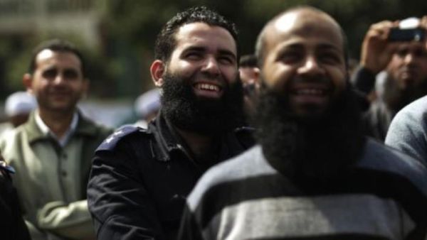 A bearded Egyptian police officer takes part in a protest in Cairo. (AFP/ File)