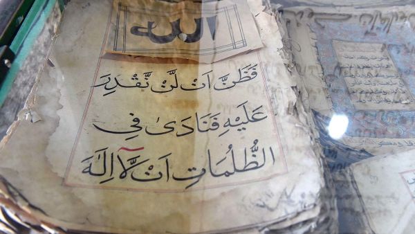 Ancient copies of the Quran displayed in a tunnel at Jabl-e-Noor. (AFP)