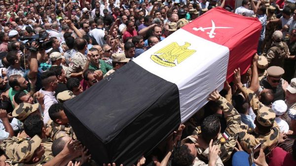 Egyptians carry the coffin of a soldier who was killed a day earlier in the restive Sinai Peninsula in an attack by ISIL, during a funeral ceremony in the 10th of Ramadan city, about 60km north of Cairo, on July 8, 2017. (Mahmoud Bakkar / AFP)