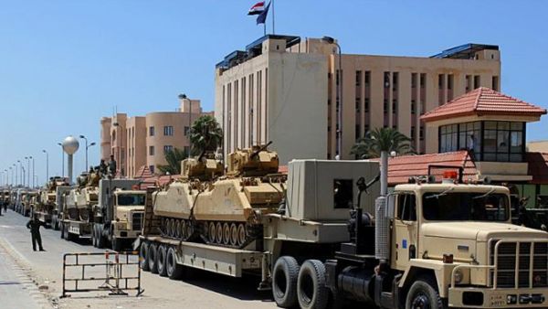 A file photo of Egyptian military vehicles rolling through a major street in Sinai. (AFP/File)